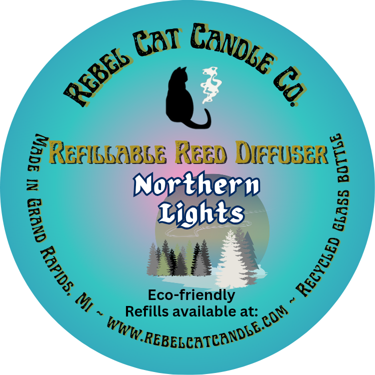 Rebel Cat Candle Co. refillable reed diffuser label with a scenic design and text.